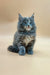 Fluffy gray Maine Coon kitten with bright blue eyes, perfect for any cat lover