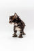 Fluffy Polydactyl Maine Coon kitten standing on a white surface for Touareg product